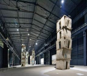 Photo of Anselm Kiefer's Seven Heavenly Palaces at Hangar Bicocca, by: Gampe - Own work, CC BY-SA 4.0, https://commons.wikimedia.org/w/index.php?curid=70618256